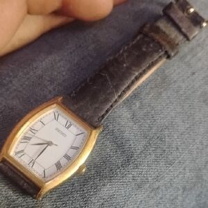 Seiko Gold Case with Black Strap Watch